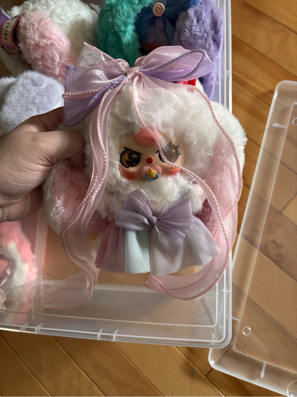 Plush Doll with Pastel Bows and Ribbon Details